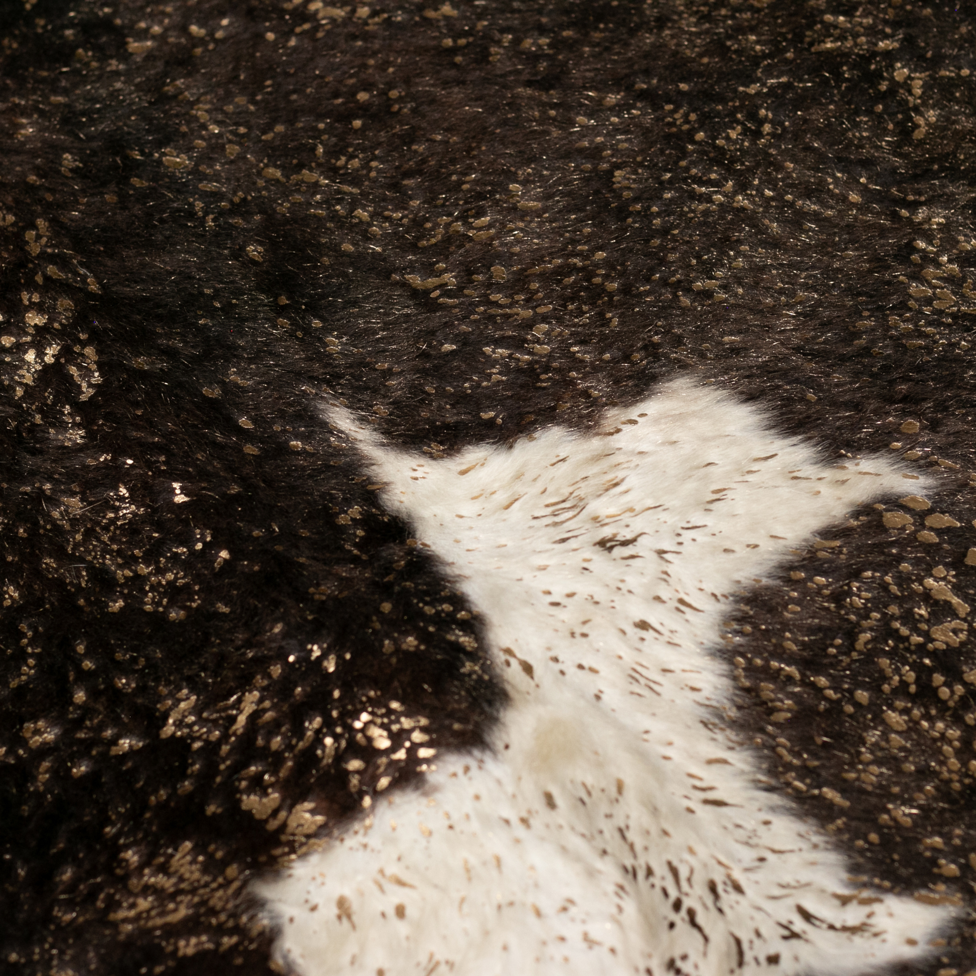 Becerro destellos dorados