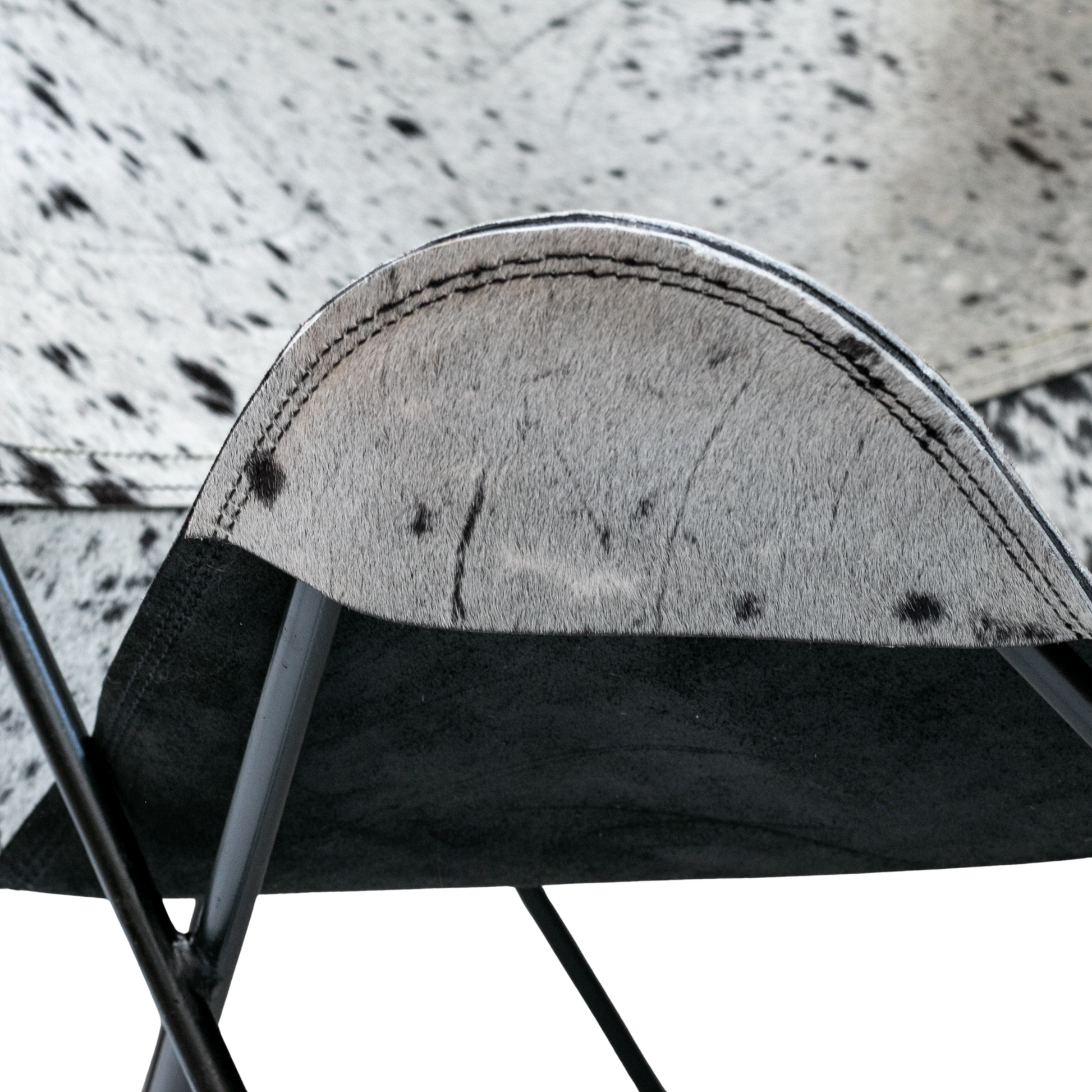 Silla mariposa con pelo granizado negro con blanco