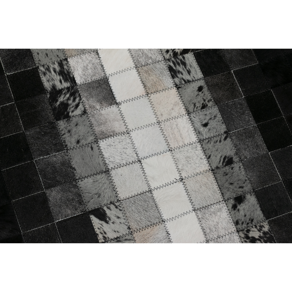 Tapete pie de cama de cuero con pelo con diseño degradado en negro, gris y blanco